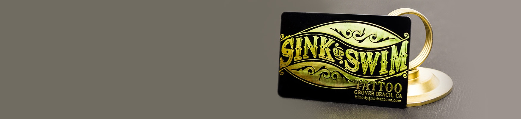 Example of Gold Foil Sink or Swim Tattoo Business Card